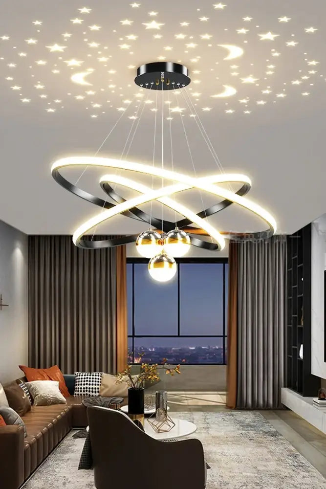 Modern black and gold DecorBites™ starry sky led chandelier with interlocking rings for living room lighting