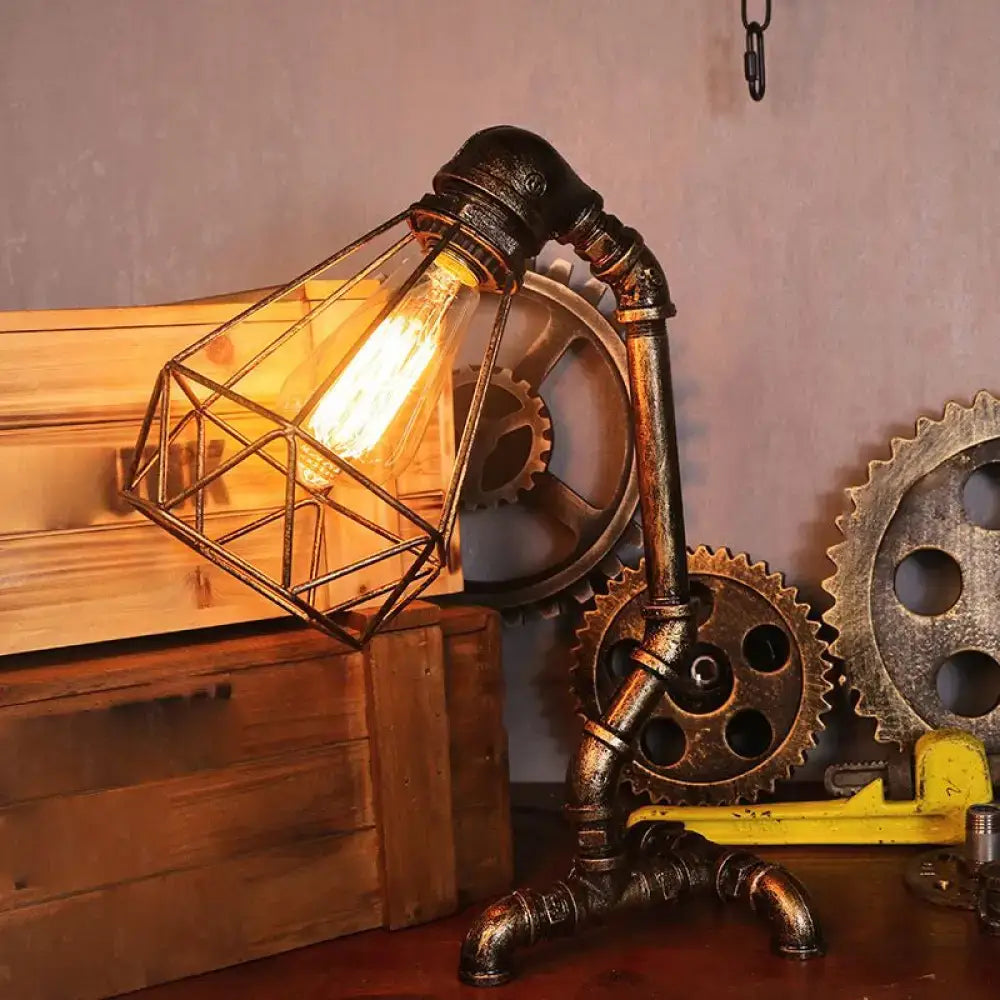 Decorbites™ steampunk style water pipe table lamp with metal antiqued bronze pipe and gear base featuring edison bulb