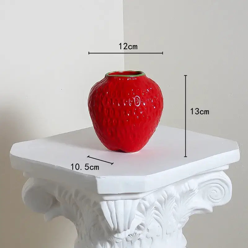Glossy red ceramic vase shaped like a textured strawberry cartoon ceramic vase for kids room by DecorBites™