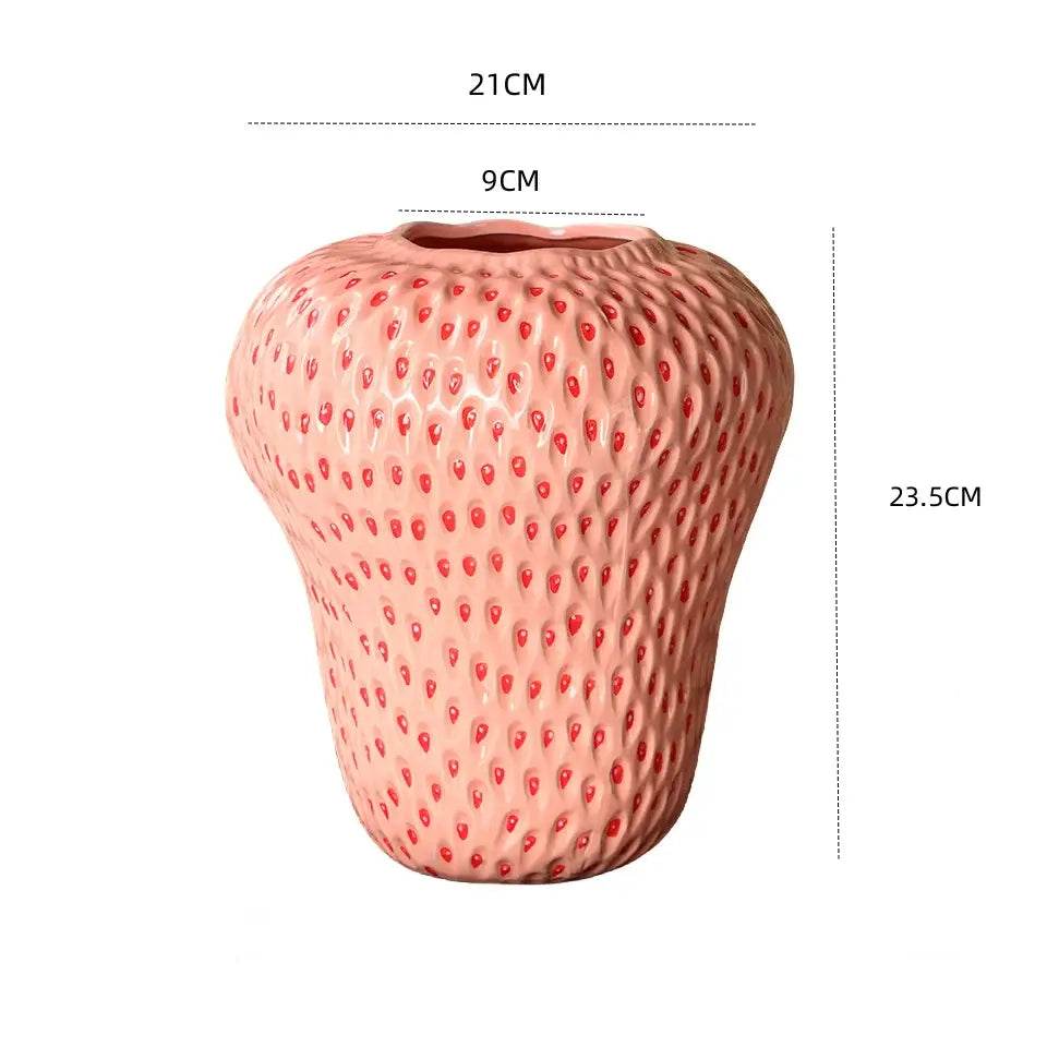 Pink ceramic vase with textured strawberry cartoon ceramic design and small red dots for kids room decor