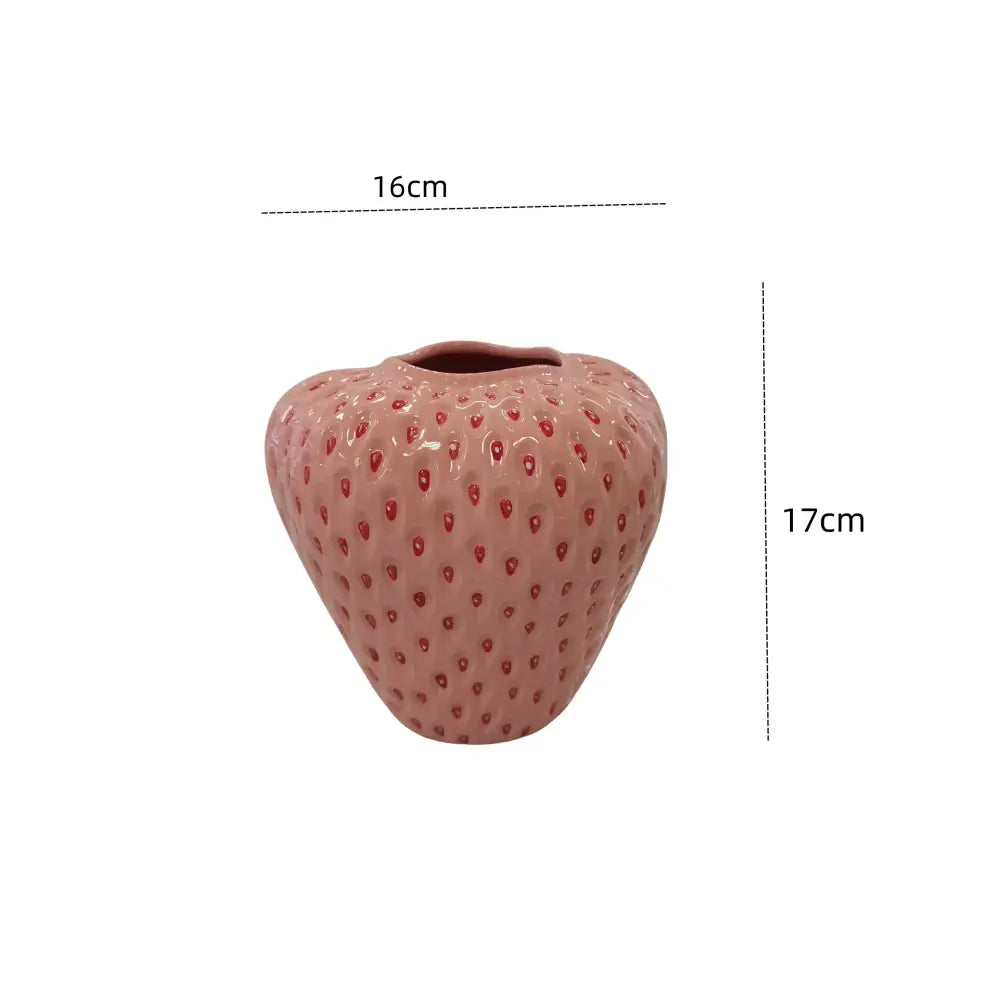 Pink ceramic strawberry cartoon ceramic vase with red seed details perfect for kids room decor by DecorBites