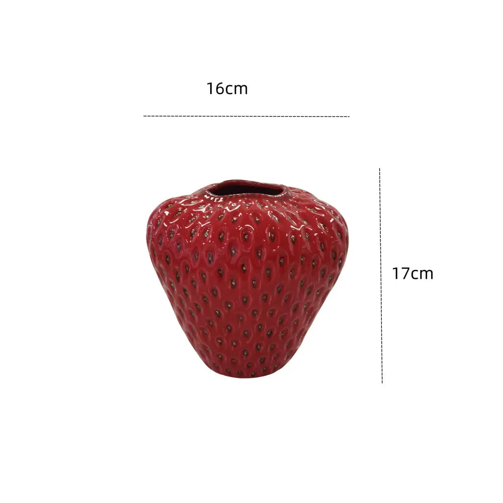 DecorBites strawberry cartoon ceramic vase is a red glossy ceramic vase with detailed seed texture for kids room decor