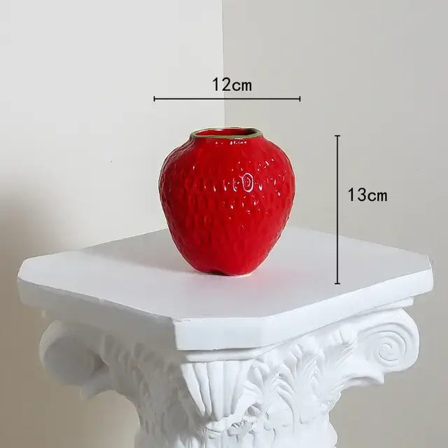 Decorbites™ strawberry cartoon flower vase is a glossy red ceramic flower vase with textured surface and gold rim