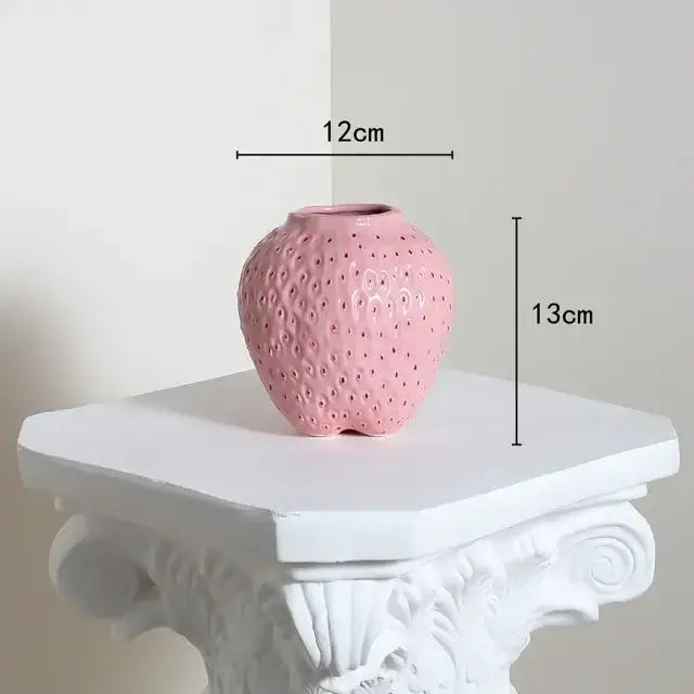 DecorBites™ pink ceramic flower vase shaped like a cartoon strawberry with a textured dotted surface for home décor