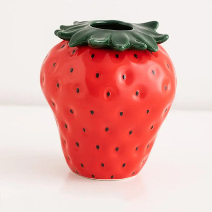 DecorBites™ glossy red ceramic strawberry shaped planter pot with black seeds and green leafy top for decor use