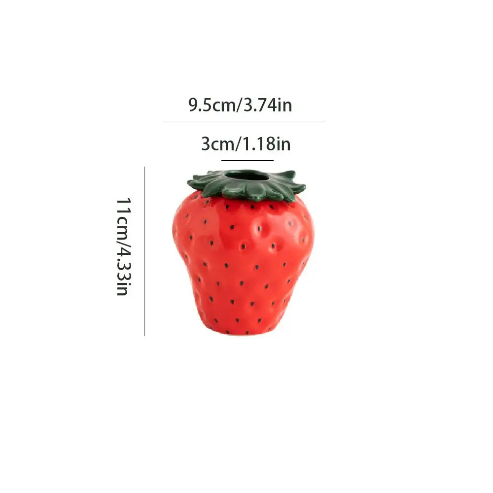 Red strawberry shaped ceramic planter pot with green leafy top by decorbites for indoor plant decoration