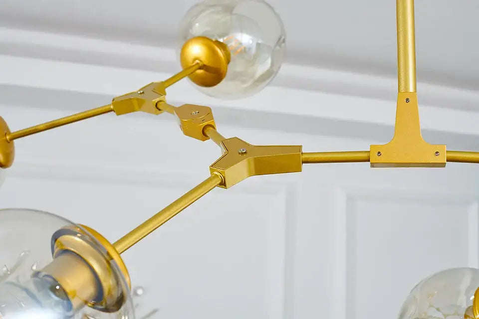 Gold-toned metal decorbites™ stylish chandelier with clear glass globe bulbs modern chandelier lighting for dining rooms