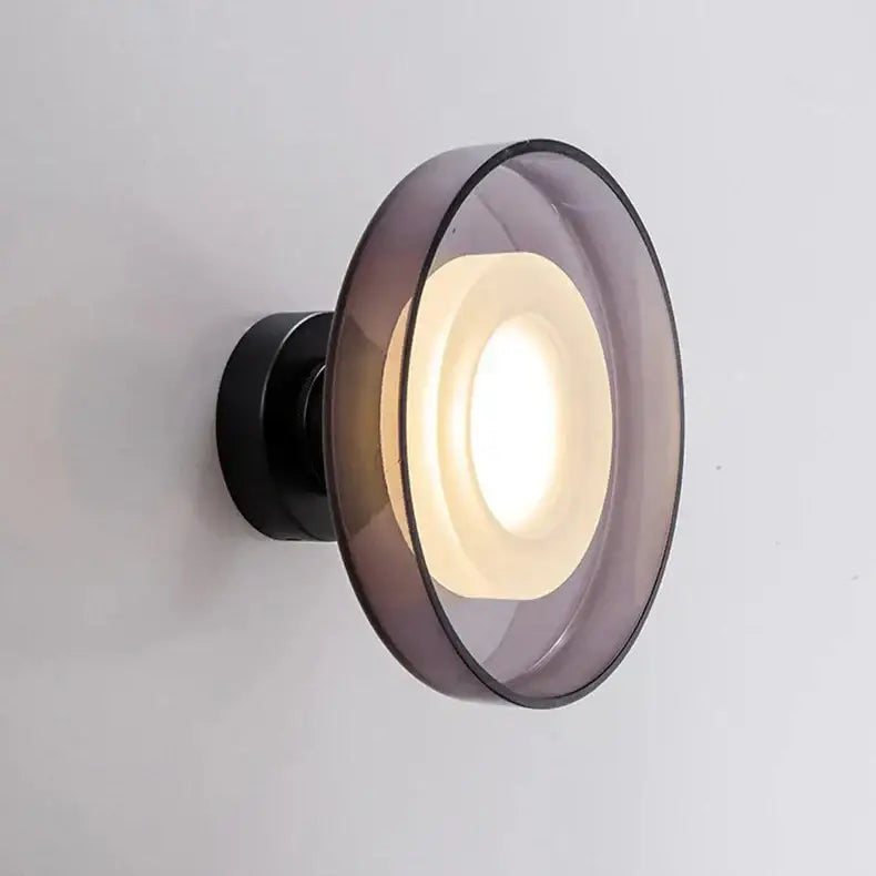 Decorbites™ stylish led wall lamp with sleek black base and translucent purple glass shade emitting warm ambient light