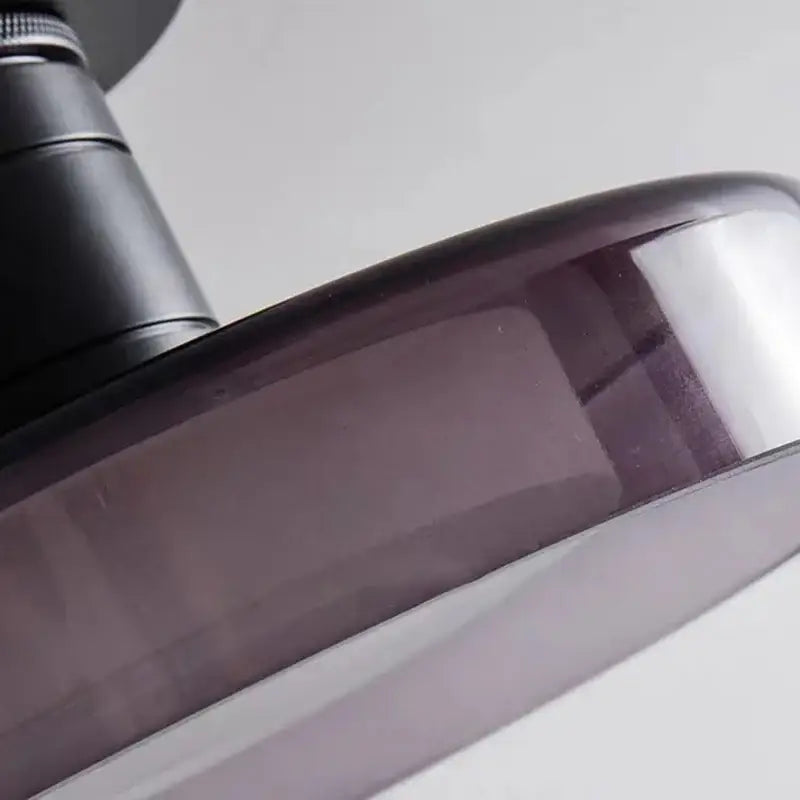 Decorbites™ stylish led wall lamp with a sleek translucent dark purple glass lampshade and a smooth curved edge