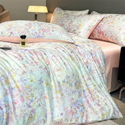 DecorBites summer floral satin silk duvet cover set with pastel blossoms in pink blue lavender and yellow soft fabric