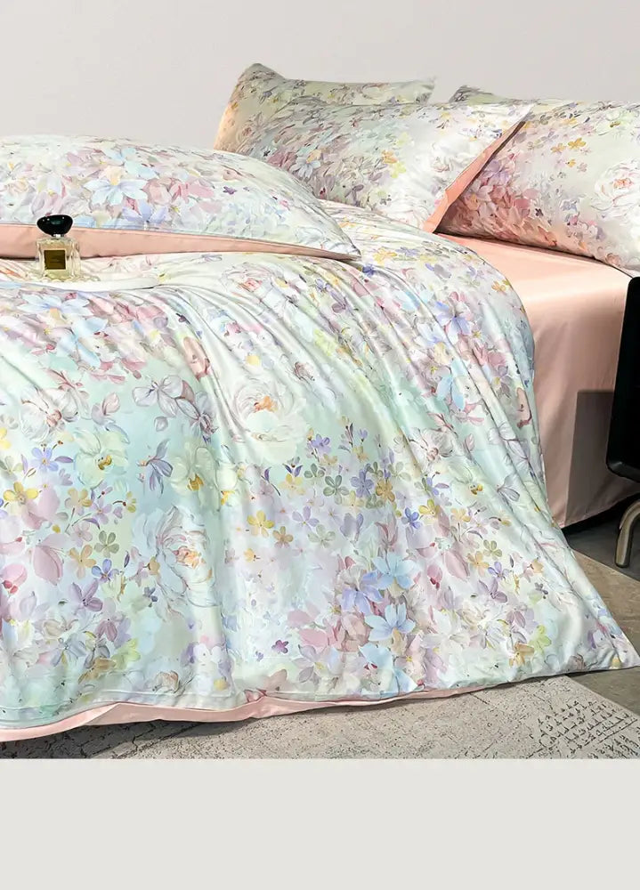 Decorbites summer floral satin silk duvet cover set with pastel mint and blush pink hues and embroidered blossoms