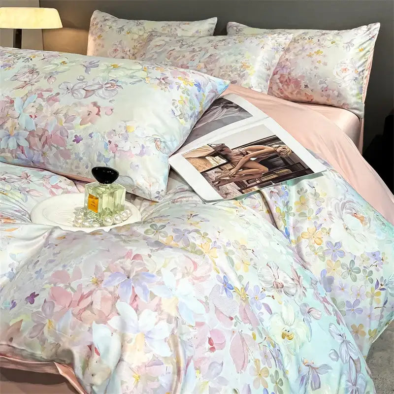 DecorBites™ summer floral satin silk duvet cover set with pastel pink, lavender, and yellow blossoms on light blue background