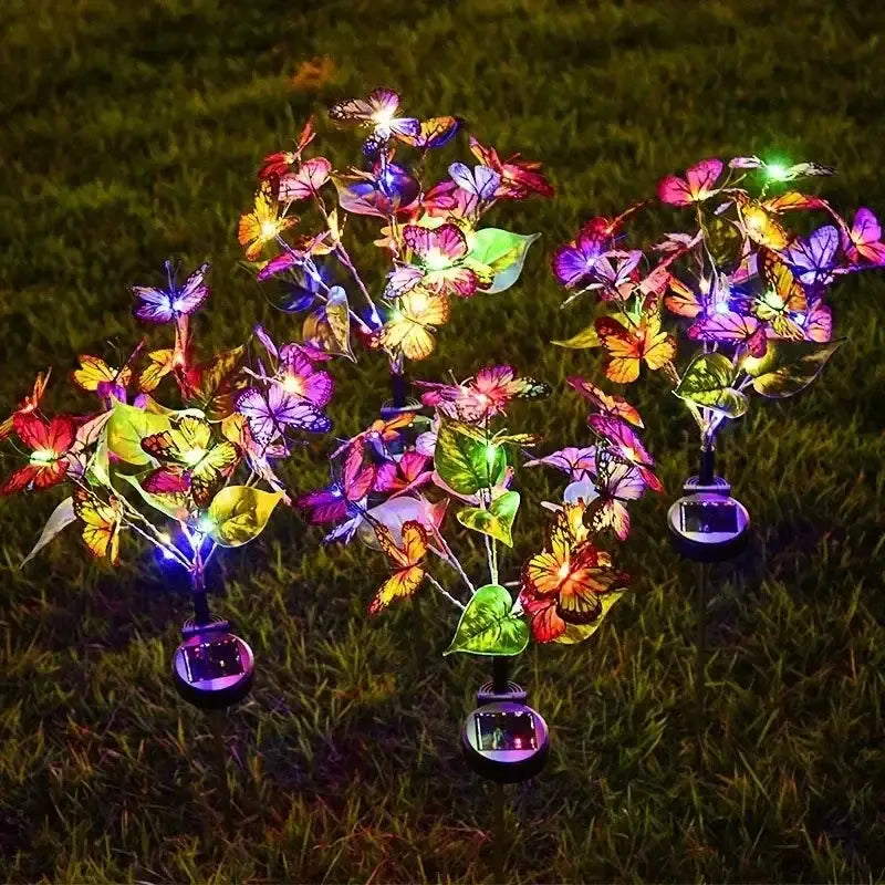 Colorful butterfly and leaf led accents on sunflower solar garden lights for vibrant outdoor solar lawn decor