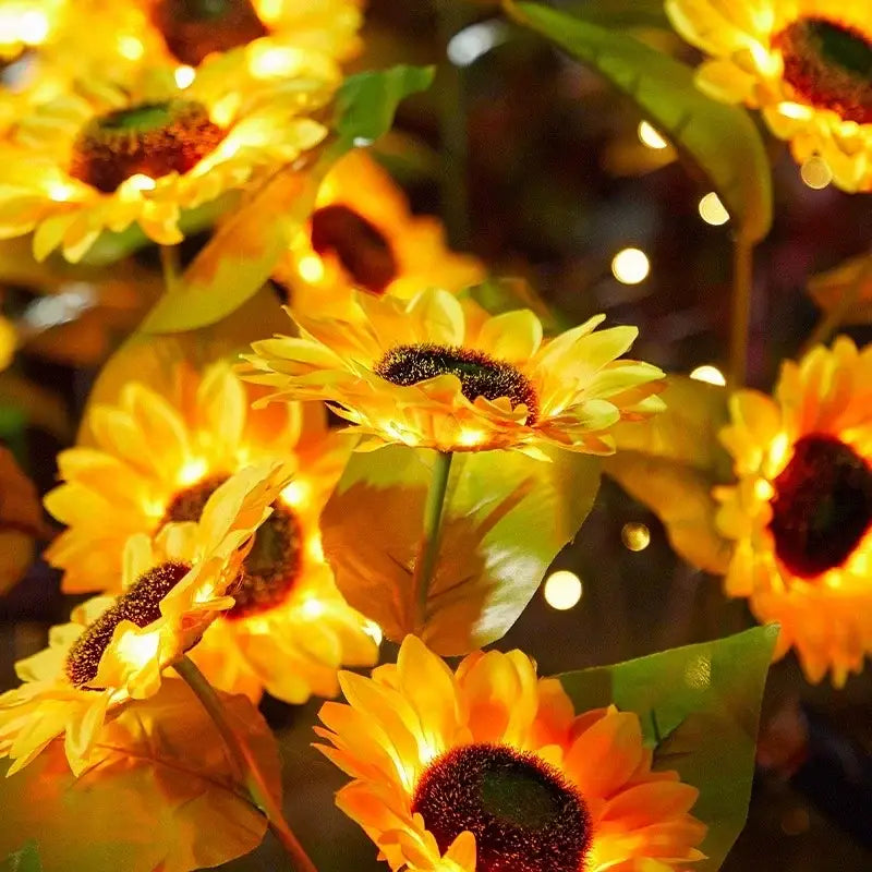 Decorbites™ sunflower solar garden lights featuring vibrant yellow petals and warm fairy lights for solar lawn decor