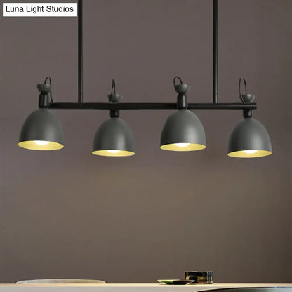 Modern black metal pendant light fixture with four dome shades emitting warm yellow light type for dining room 110v-120v