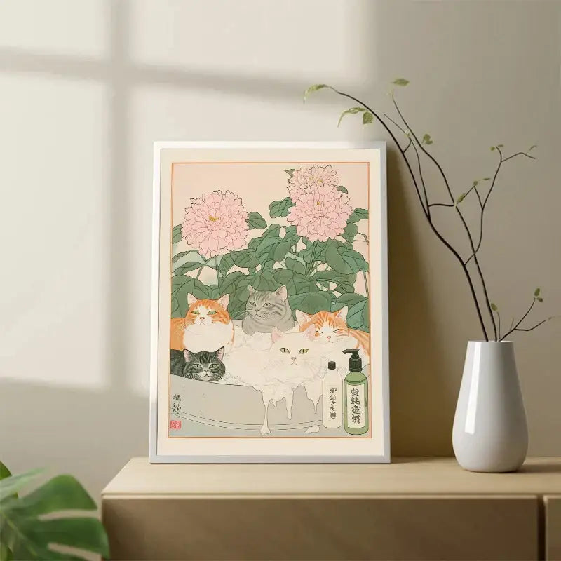 A framed DecorBites™ wall art featuring five tabby cats among pink peonies and green leaves with pet shampoo bottle
