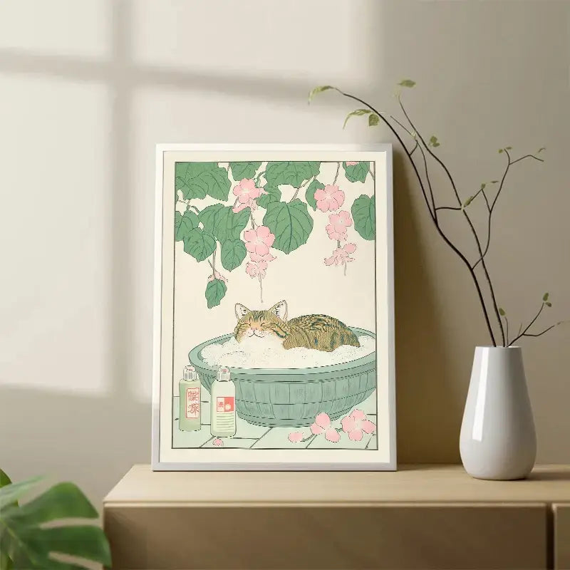 Decorbites™ tabby cat wall art featuring a japanese tabby cat lounging in a green basin with pink blossoms