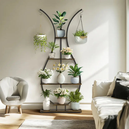 DecorBites tall dark metal plant stand with wood accents and vase shape holds multiple ceramic potted plants