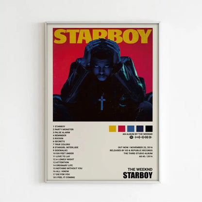 A framed DecorBites™ The Weeknd music album poster with bold yellow text on red for stylish home decor