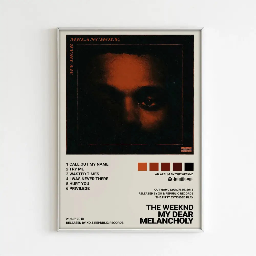 A framed poster of the weeknd music album my dear melancholy featuring dark orange lighting for home decor