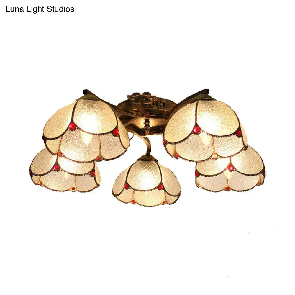 Decorbites tiffany stained glass ceiling light in antique bronze with five scalloped frosted glass shades and red gemstone accents