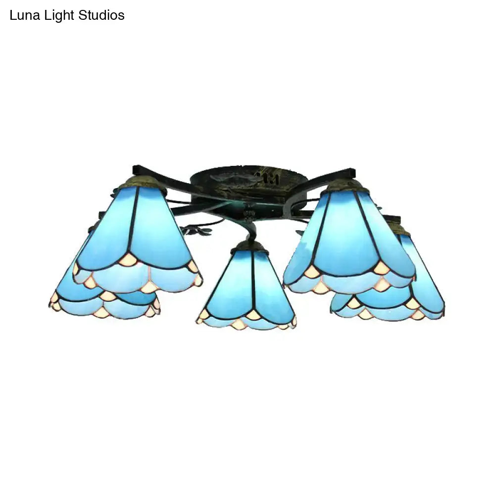 Blue tiffany stained glass ceiling light fixture with five bell-shaped shades in antique bronze for bedroom use