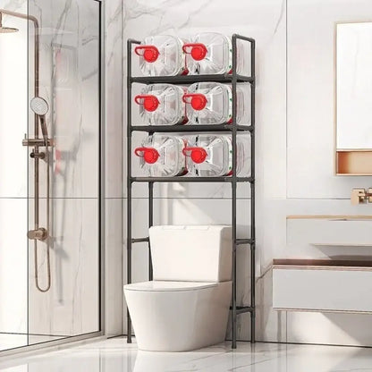 Black metal three-tier DecorBites™ storage rack with six clear water jugs for efficient toilet and bathroom storage