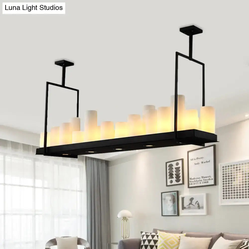 Black metal island pendant light with modern geometric frame and traditional barrel frosted glass shades for dining room