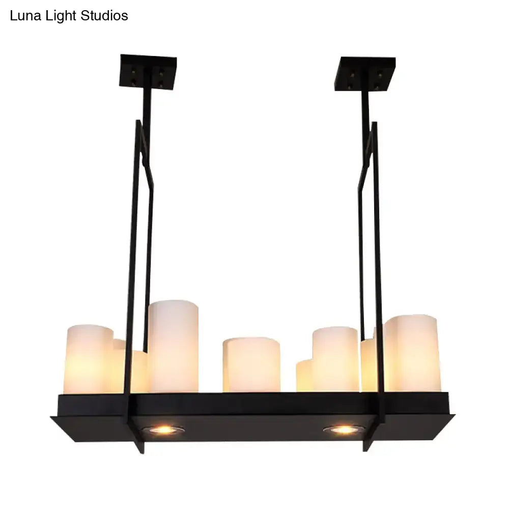 Black metal island pendant light with traditional barrel frosted glass candle-style shades for dining room