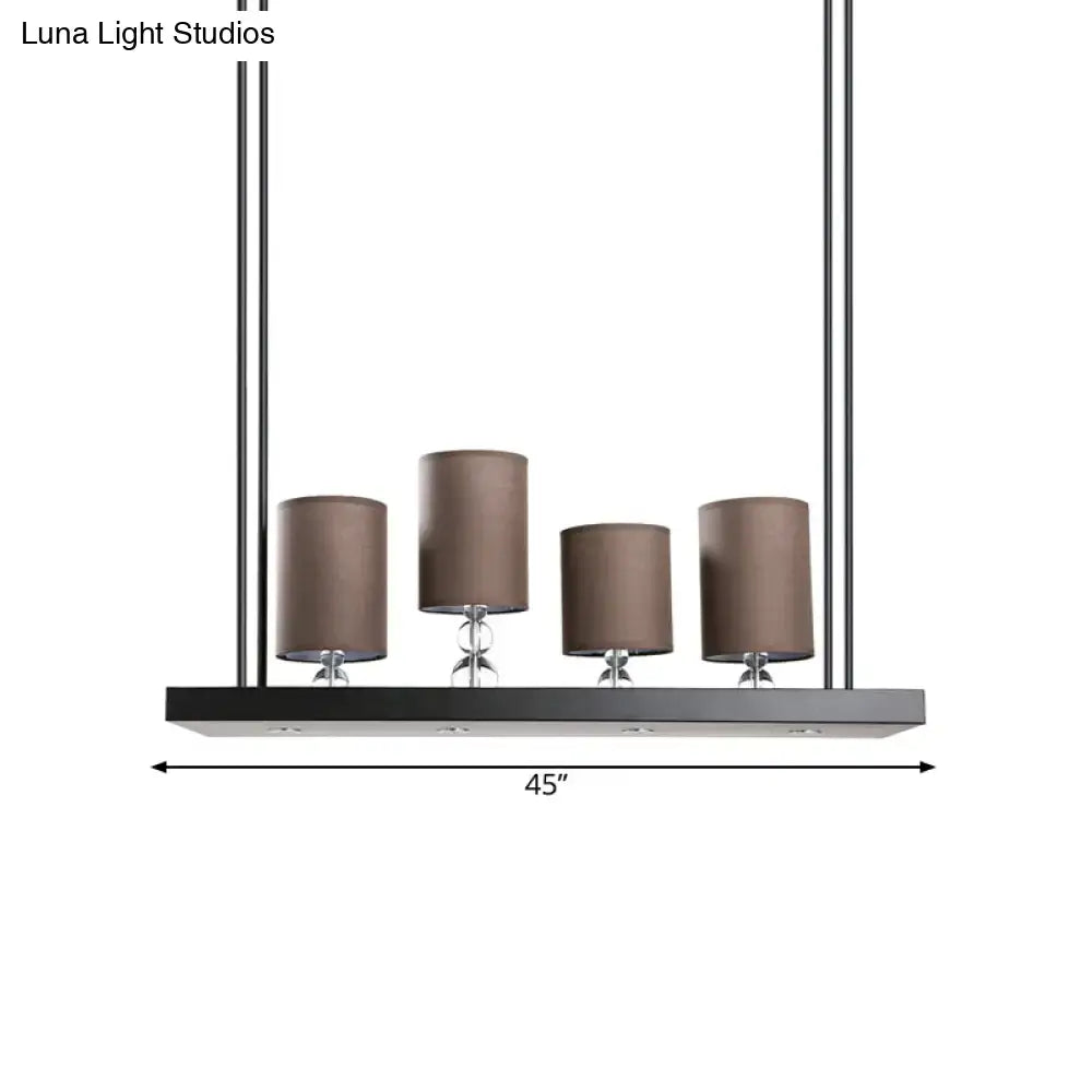 DecorBites™ traditional black cylinder island light fixture with fabric shades and metal linear shelf for dining rooms