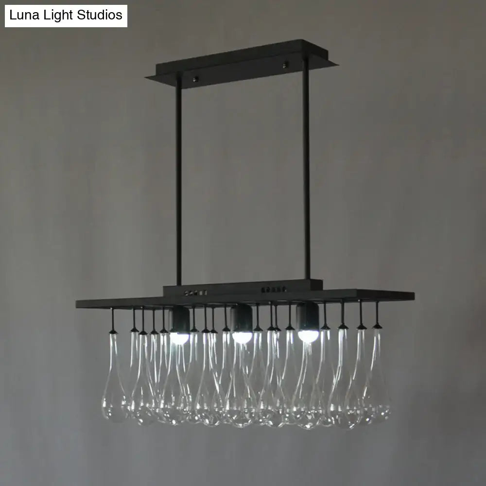 DecorBites™ traditional black metal island pendant light with three clear glass rectangles and warm white light