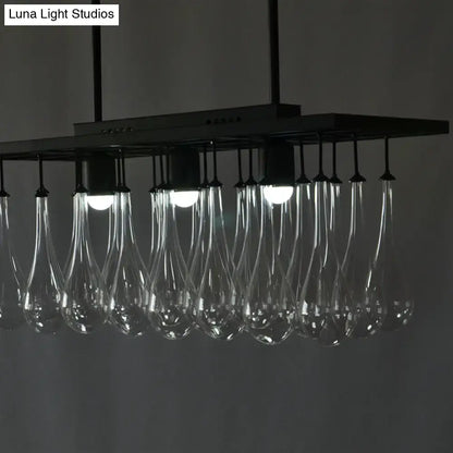 Modern black metal island pendant light with clear glass teardrop pendant lights for warm white illumination