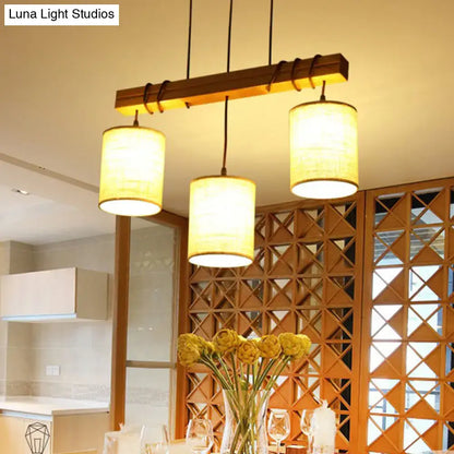 Warm-toned decorbites traditional fabric wood pendant barrel lights with textured shades hang over dining room bar with e26 e27 sockets