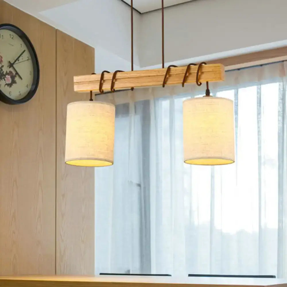 Rustic wooden pendant light with two beige fabric shades and dark metal hooks ideal for dining room fixture width e26 e27