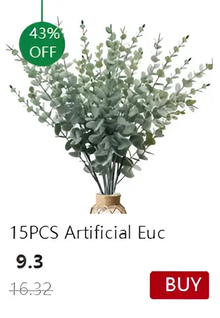 A bundle of 15 artificial eucalyptus branches in green foliage arranged in a woven base with decorbites™ transparent nordic vase