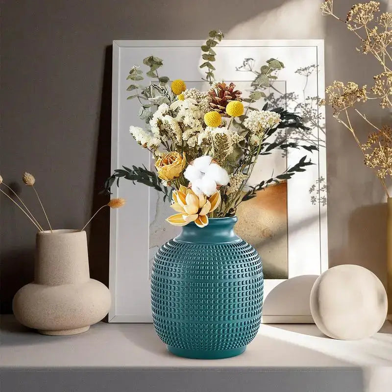 Teal ceramic DecorBites™ unbreakable modern floral vase with textured dimples holding dried flowers for home decor