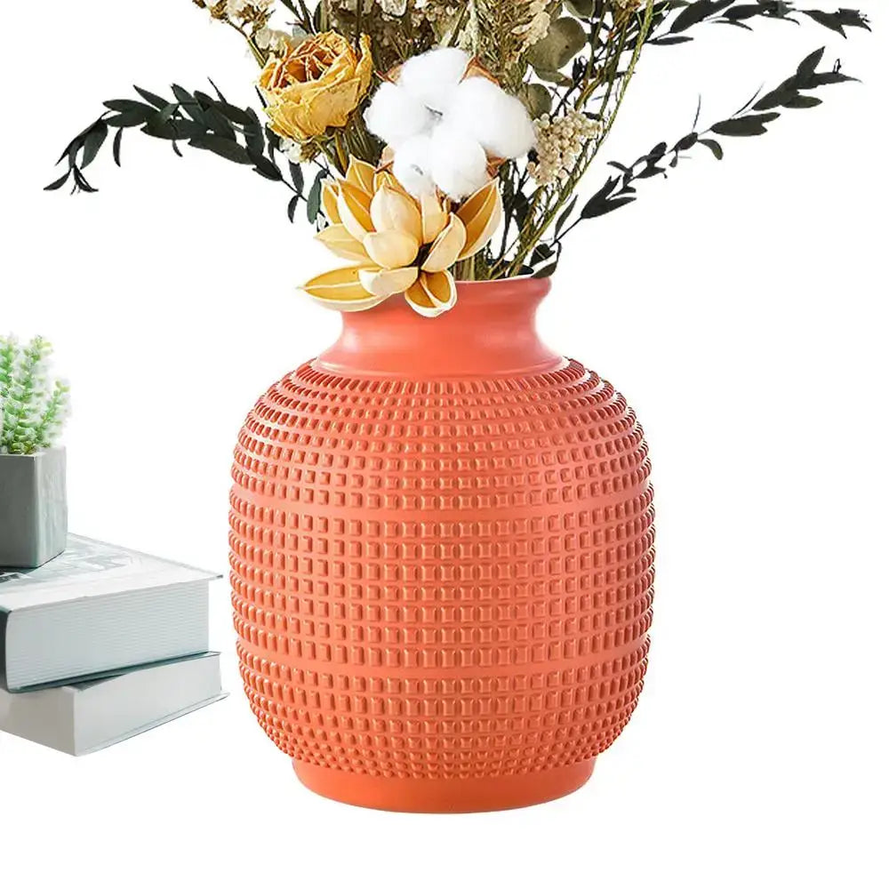 A terracotta-colored DecorBites™ unbreakable modern floral vase with textured grid pattern for home decor