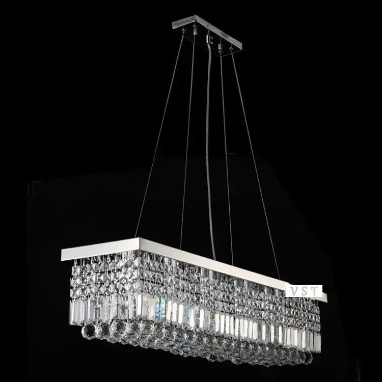 Rectangular modern crystal chandelier with sleek chrome frame and cascading faceted crystals for dining room use