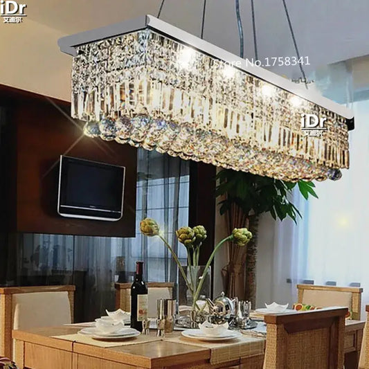 DecorBites™ upscale modern crystal chandelier with a rectangular metallic frame and cascading glass for dining room