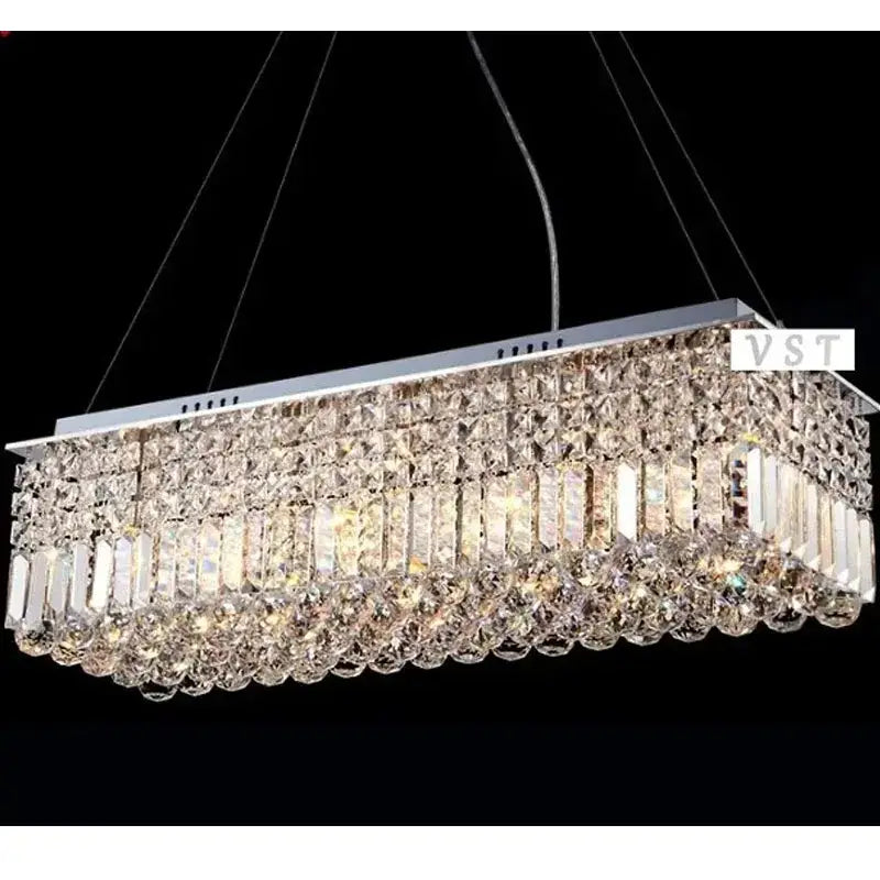 DecorBites upscale modern crystal chandelier with chrome frame and clear crystal tiers for dining room lighting