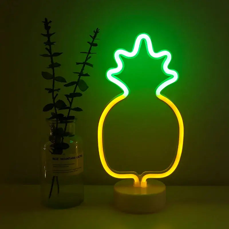 A glowing led neon pineapple lamp with green top and yellow body illuminated as a usb neon sign decoration