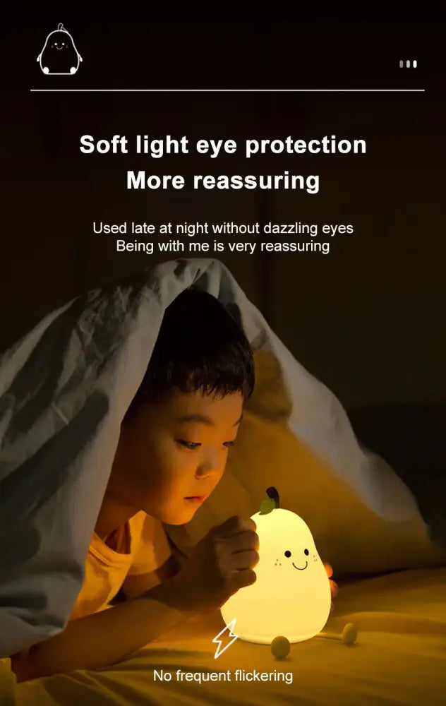 A soft pear-shaped rechargeable night light with a smiling face and green leaf detail by decorbites silicone bedside lamp
