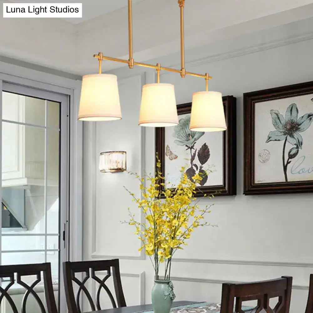 Decorbites vintage gold-toned pendant light with three off-white fabric shades in retro style bucket island design
