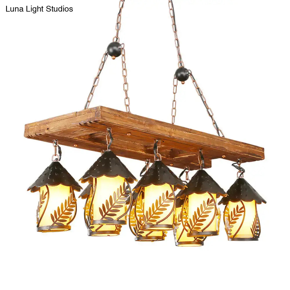 Decorbites vintage 8-light island pendant chandelier with rustic wooden plank, amber glass lanterns, and black metal roofs