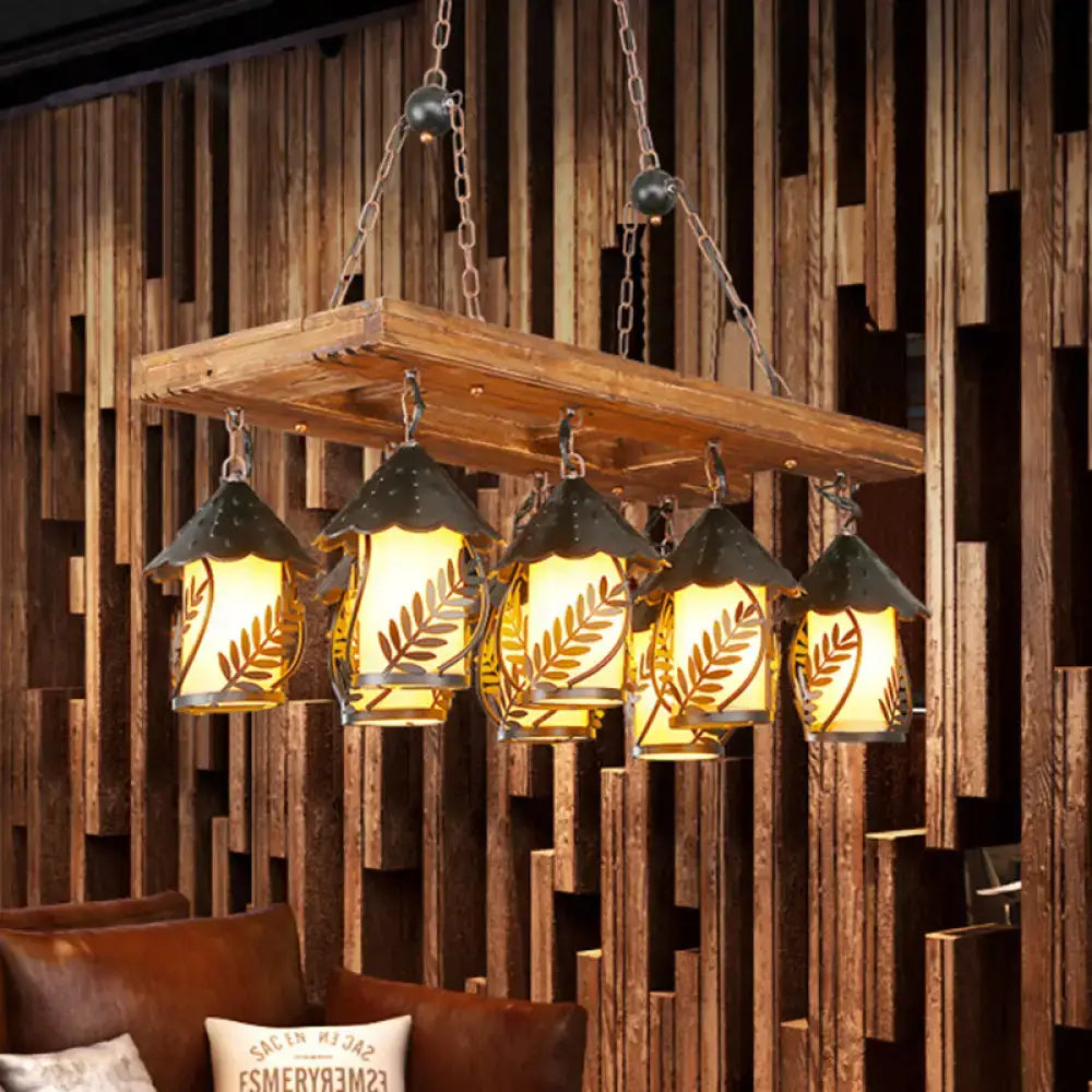 Rustic wooden chandelier with five amber glass lanterns and leaf etchings from decorbites vintage 8-light island pendant in black with rectangle white fabric and clear glass construction