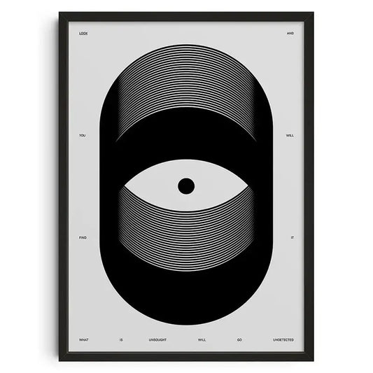 Black-framed DecorBites™ vintage abstract canvas print featuring a stylized white eye design on a light gray background