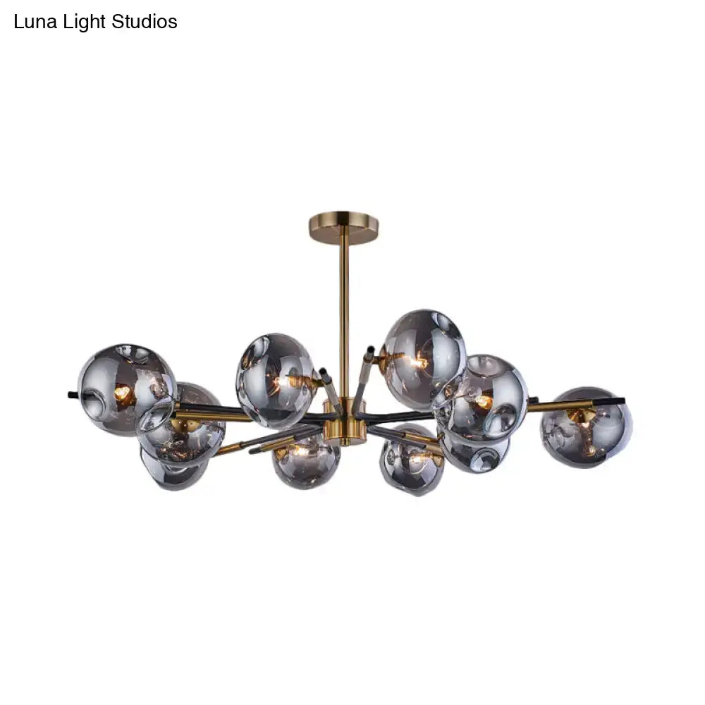 Modern brass-finished decorbites™ flush mount chandelier with frosted glass spheres and 10 lights for living room