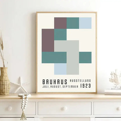 A minimalist decorbites canvas print featuring a vintage black and white modernism exhibition design in muted teal and mauve tones