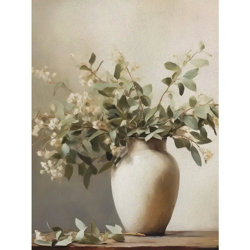 Cream-colored ceramic vase with white flowers and green eucalyptus leaves featured in DecorBites™ vintage floral vase wall art