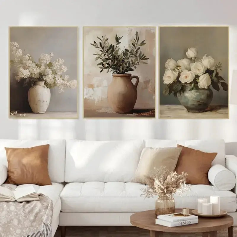 DecorBites vintage floral vase canvas wall art featuring three framed prints of rustic ceramic vases with muted earth tones